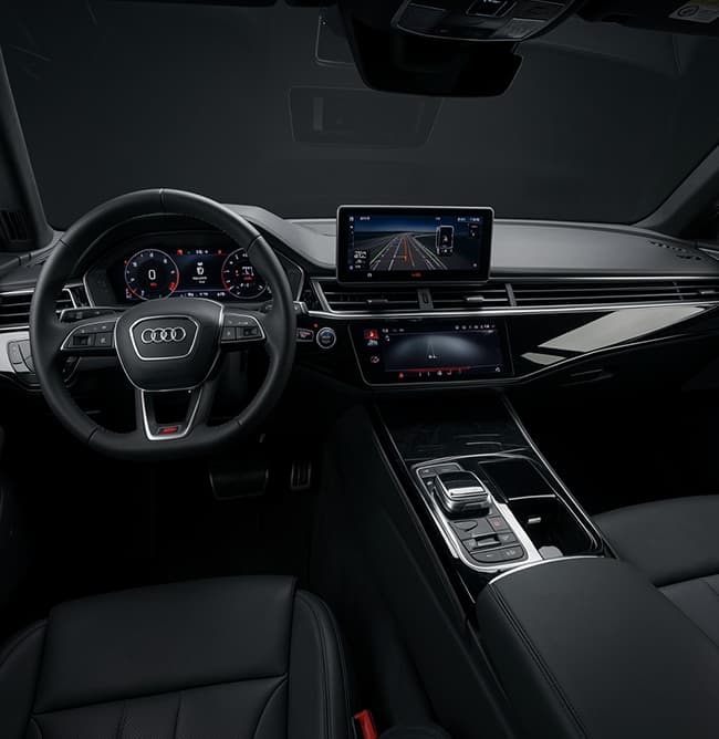 Audi Premium Sedan dashboard and front passenger cabin view